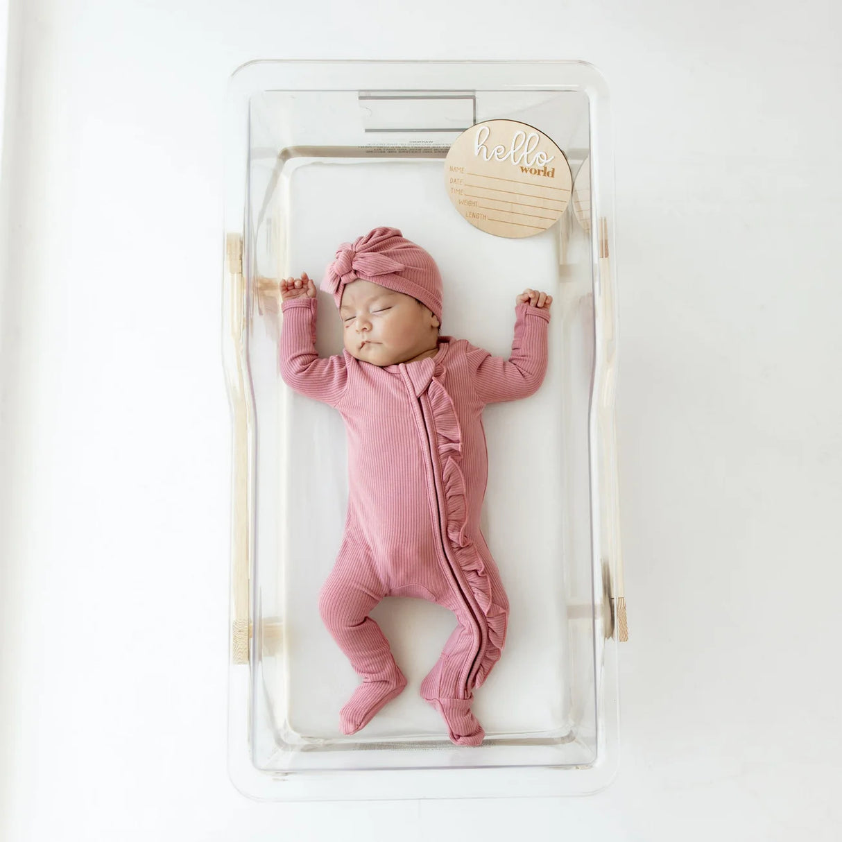 Kyte Baby Ribbed Ruffle Zipper Footie - Apple Blossom