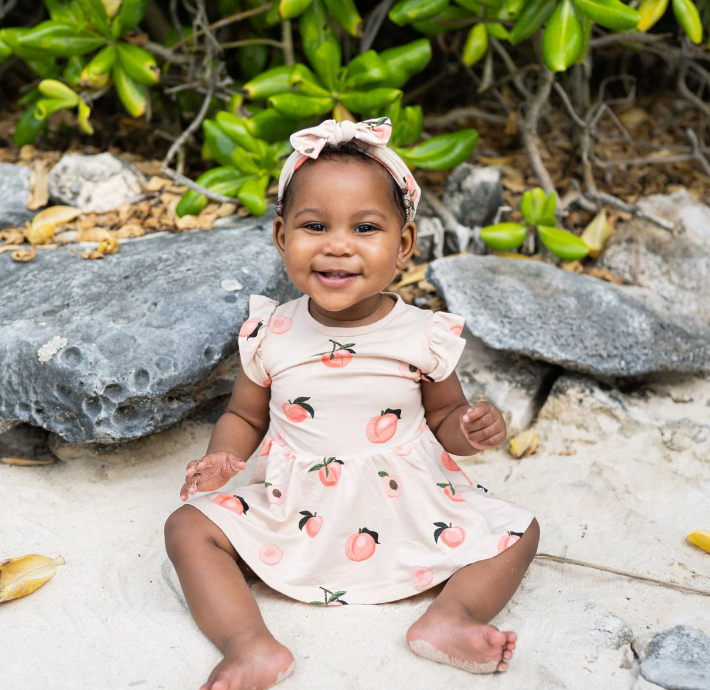 Kyte Baby Twirl Bodysuit Dress - Peach