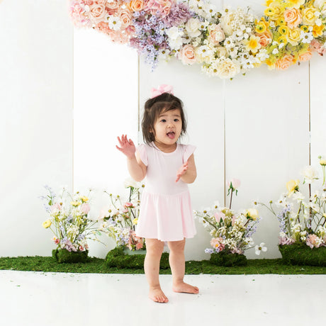 Kyte Baby Twirl Bodysuit Dress - Sakura