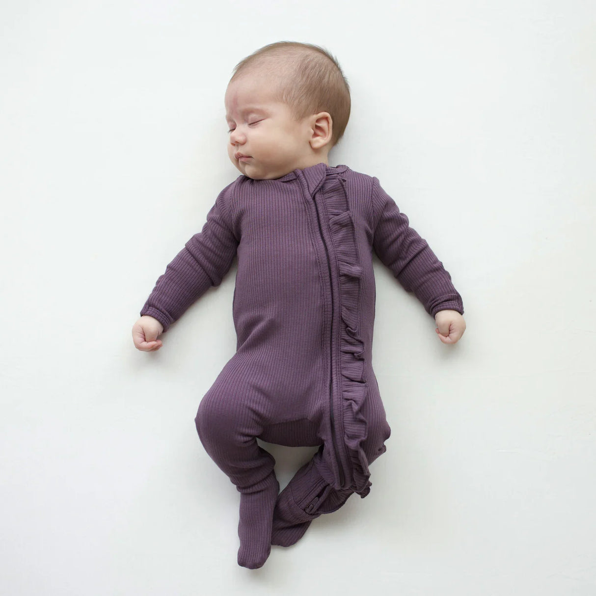 Ribbed Ruffle Zipper Footie in Currant